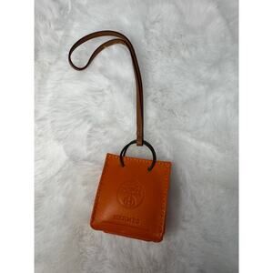 Hermès “Faubourg” square leather bag charm
